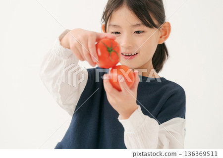 Girls with tomatoes 136369511