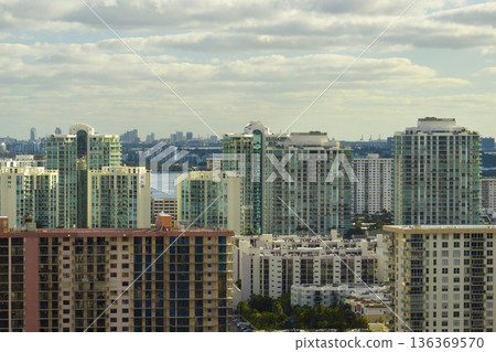 Expensive highrise hotels and condos on Atlantic ocean shore in Sunny Isles Beach city. American tourism infrastructure in southern Florida 136369570