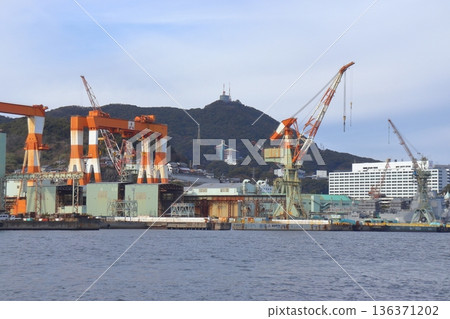 Nagasaki Shipyard and Inasayama Observatory seen from the sea (Nagasaki City, Nagasaki Prefecture) 136371202
