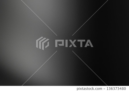 Black carbon fiber texture with subtle diagonal mesh patterns and elegant soft lighting for high tech background Black carbon fiber texture with subtle diagonal mesh patterns and elegant soft lighting for high tech background 136373480