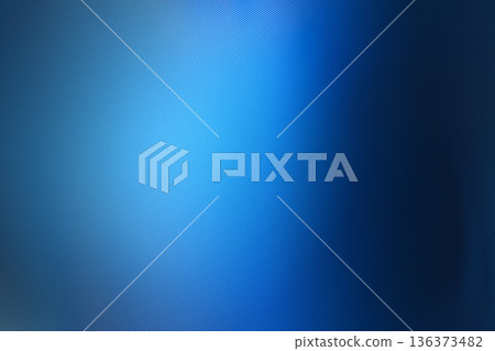 Vibrant cobalt blue metallic texture with central spotlight effect and fine linear mesh for futuristic interface background design 136373482
