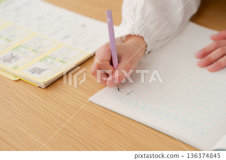 Elementary school girl studying Elementary school girl studying 136374845