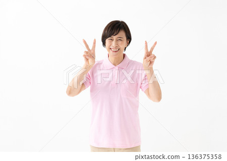 Caregiver making a peace sign Caregiver making a peace sign 136375358