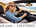 Woman driving on the sea 136376601