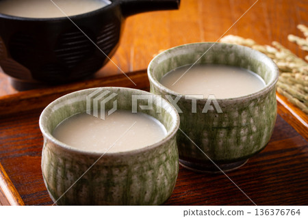 Drinking amazake 136376764