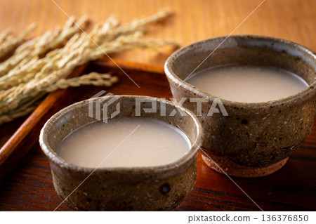 Drinking amazake Drinking amazake 136376850