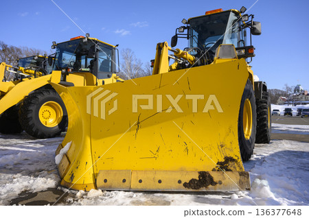 Heavy machinery engaged in snow removal work Heavy machinery engaged in snow removal work 136377648
