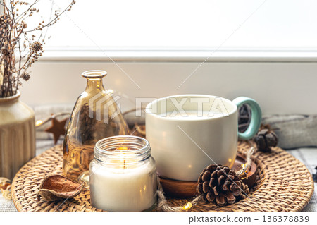 Cozy home composition with coffee cup and home decor details. 136378839