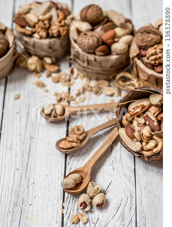 different nuts in plates 136378890