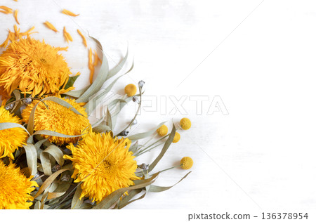Autumn flat lay composition with sunflowers on a white background. Autumn flat lay composition with sunflowers on a white background. 136378954