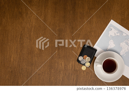 Flat lay travel composition with world map on wooden background. 136378976