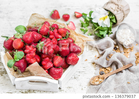 Fresh strawberries on a wooden tray Fresh strawberries on a wooden tray 136379037