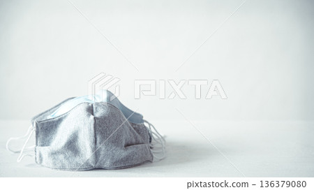 Handmade face protective masks on white background copy space. 136379080