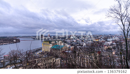 Landscape of a large industrial city in cloudy weather. Landscape of a large industrial city in cloudy weather. 136379162