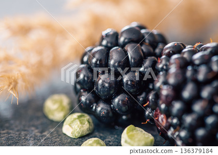 Macro shot of ripe blackberries, natural background. 136379184