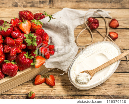 arrangement with fresh strawberries on wooden background 136379318
