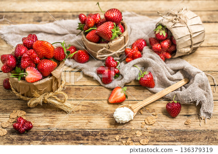 arrangement with fresh strawberries on wooden background 136379319