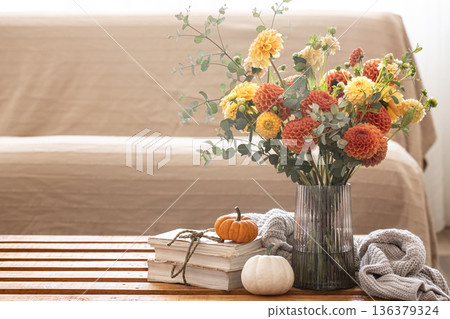 Autumn background with a bouquet of chrysanthemums and pumpkins, copy space. 136379324