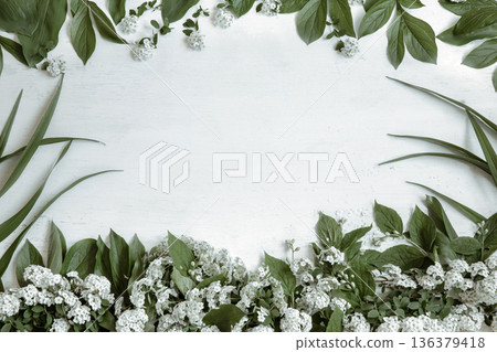 Floral arrangement with spring leaves and flowers copy space. Floral arrangement with spring leaves and flowers copy space. 136379418
