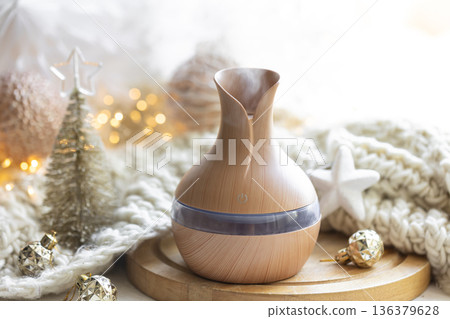 Christmas still life with an aroma diffuser for moisturizing the air. 136379628