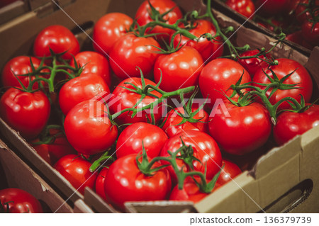Close-up, tomatoes in a box on the counter. 136379739