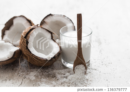coconut on wooden background coconut on wooden background 136379777