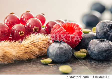 Natural background with different wild berries, macro shot. 136380615