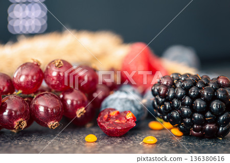 Natural background with different wild berries, macro shot. 136380616