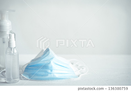 Coronavirus prevention hand sanitizer and protection face masks against coronavirus copy space. Coronavirus prevention hand sanitizer and protection face masks against coronavirus copy space. 136380759