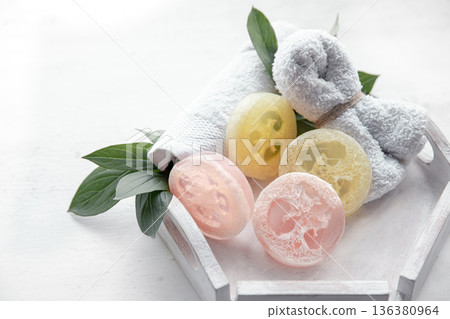 Spa still life with towel and loofah close up. 136380964