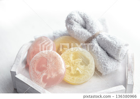 Spa still life with towel and loofah close up. 136380966