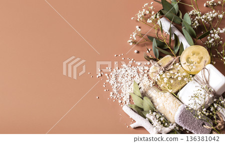 Spa or health plan frame with towels, soap, leaves, flowers, bath bombs 136381042