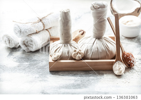 Spa still life with fresh coconut and body care products Spa still life with fresh coconut and body care products 136381063