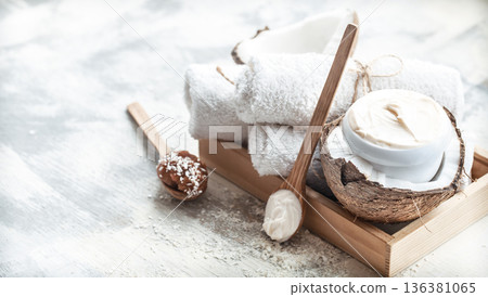 Spa still life with fresh coconut and body care products Spa still life with fresh coconut and body care products 136381065