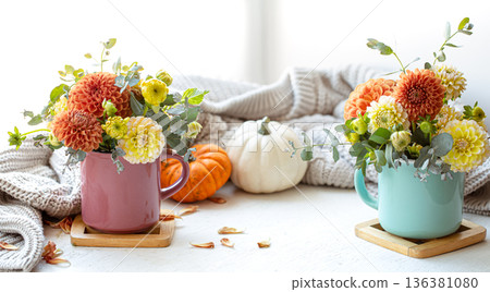 Spring composition with chrysanthemum flowers on a blurred background. Spring composition with chrysanthemum flowers on a blurred background. 136381080