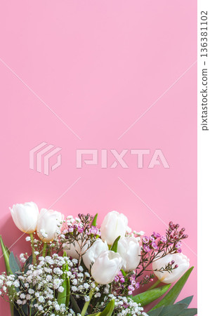 spring flower arrangement on a pink background spring flower arrangement on a pink background 136381102