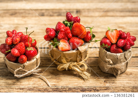 Strawberry on wooden background Strawberry on wooden background 136381261