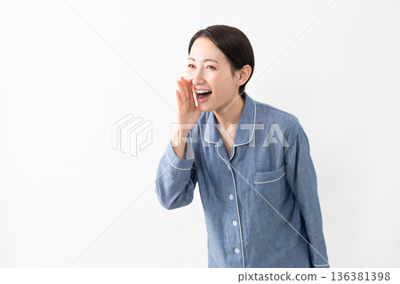 Woman wearing pajamas Lifestyle image Woman wearing pajamas Lifestyle image 136381398