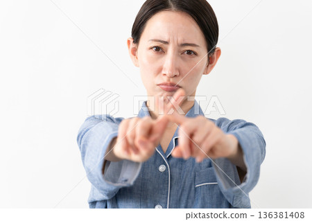 Woman wearing pajamas Lifestyle image Woman wearing pajamas Lifestyle image 136381408