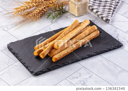 Baked Italian Grissini sticks heap Baked Italian Grissini sticks heap 136381540