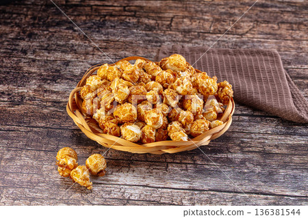 Sweet crunchy popcorn with caramel Sweet crunchy popcorn with caramel 136381544