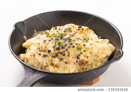 Corn, potato salad, baked cheese 136381636