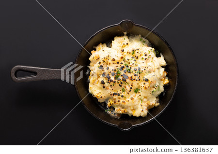 Corn, potato salad, baked cheese 136381637