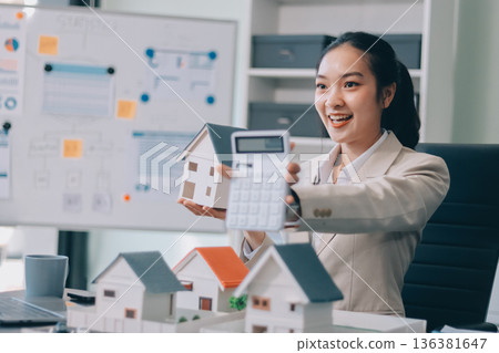 real estate agent home miniature model on documents sale and purchase of apartment notarial deed real estate agent home miniature model on documents sale and purchase of apartment notarial deed 136381647
