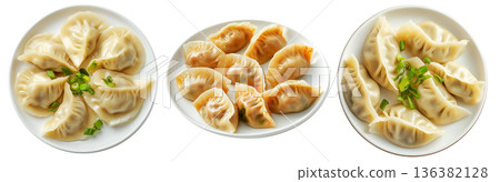 Steamed mandu dumplings placed in circular pattern on ceramic plate, isolated on white transparent background Steamed mandu dumplings placed in circular pattern on ceramic plate, isolated on white transparent background 136382128