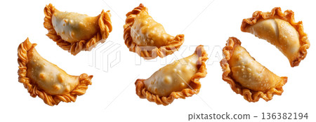 Fried baked pastry empanadas filled with ground beef cheese ham and crimped edges, isolated on white background Fried baked pastry empanadas filled with ground beef cheese ham and crimped edges, isolated on white background 136382194
