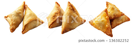 Golden brown crispy samosas isolated on white transparent background, traditional Indian snack concept 136382252