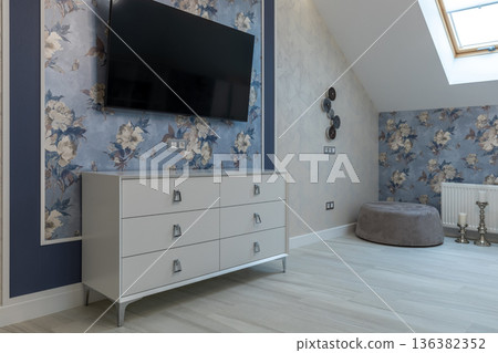 Modern Bedroom Media Area with White Dresser and Wall Mounted TV 136382352