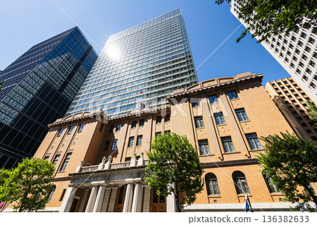 Low-angle view of the Mitsubishi UFJ Trust and Banking Museum, situated in the Marunouchi business and financial district, Chiyoda, Tokyo, Japan. 136382633