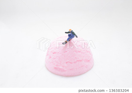 a Miniature Snowboarder on Steamed Cake Trio a Miniature Snowboarder on Steamed Cake Trio 136383204